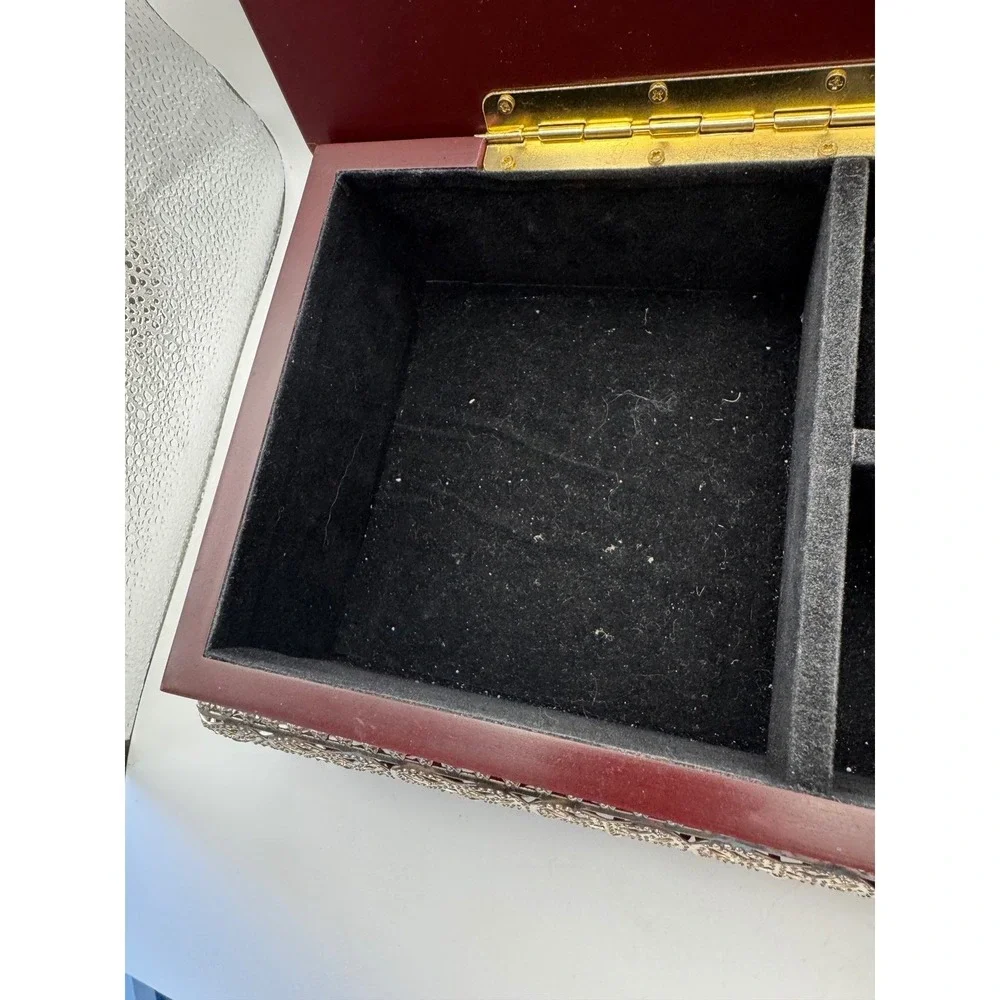 Elegant Wooden Jewelry Box with Ornate Metal Accents and Mirror